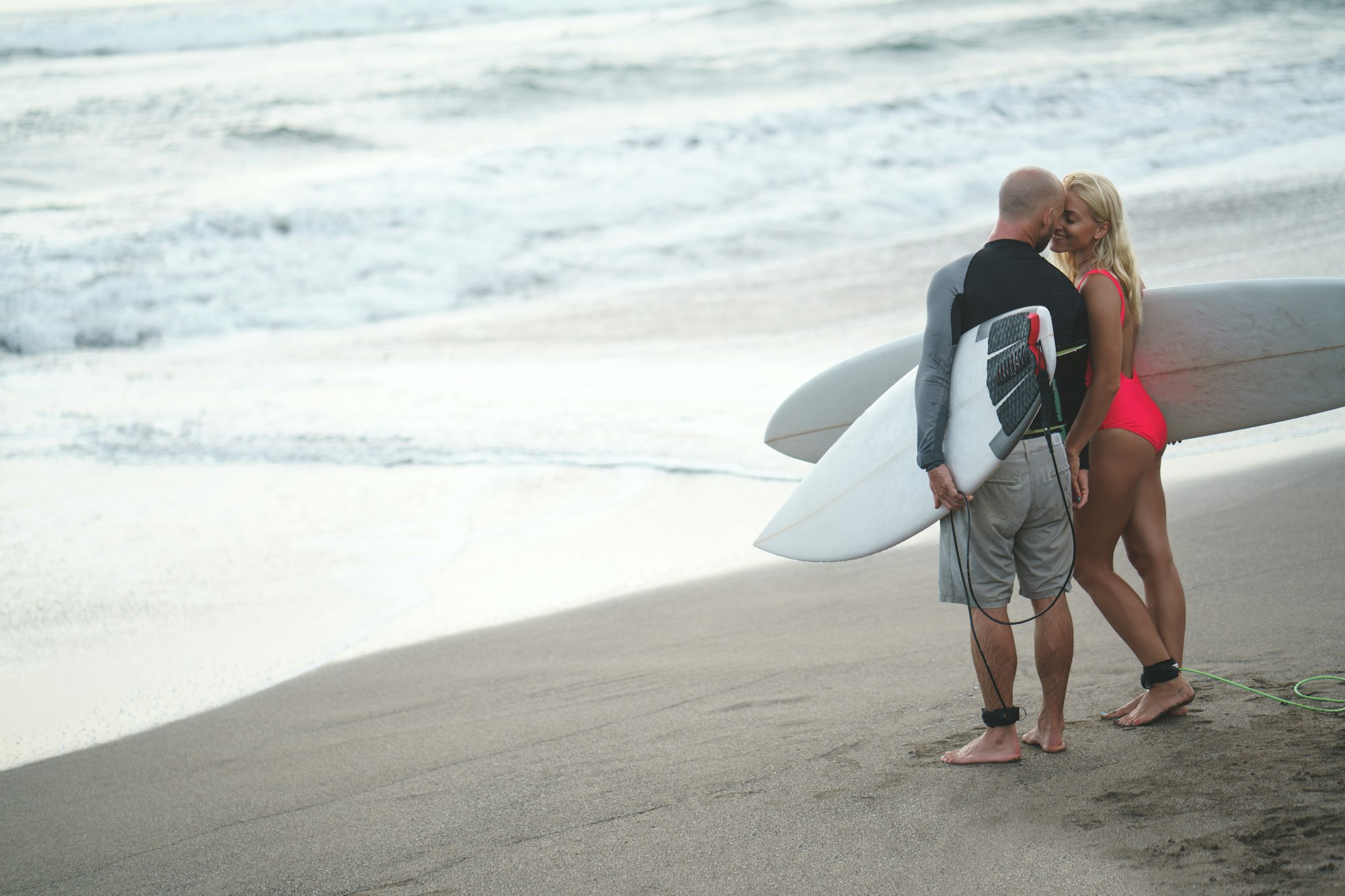 Surfing couple